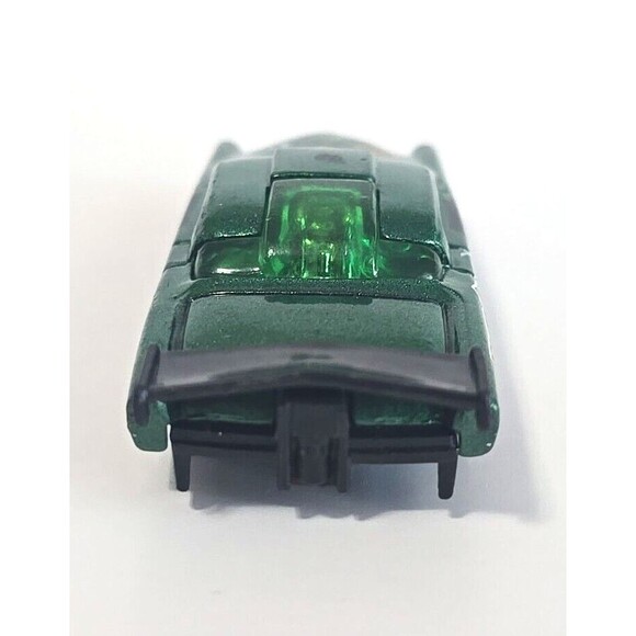 Hot Wheels 1998 Freaks of Horror At-A-Tude Green Metalflake with Graphics 1:64 - Picture 5 of 6